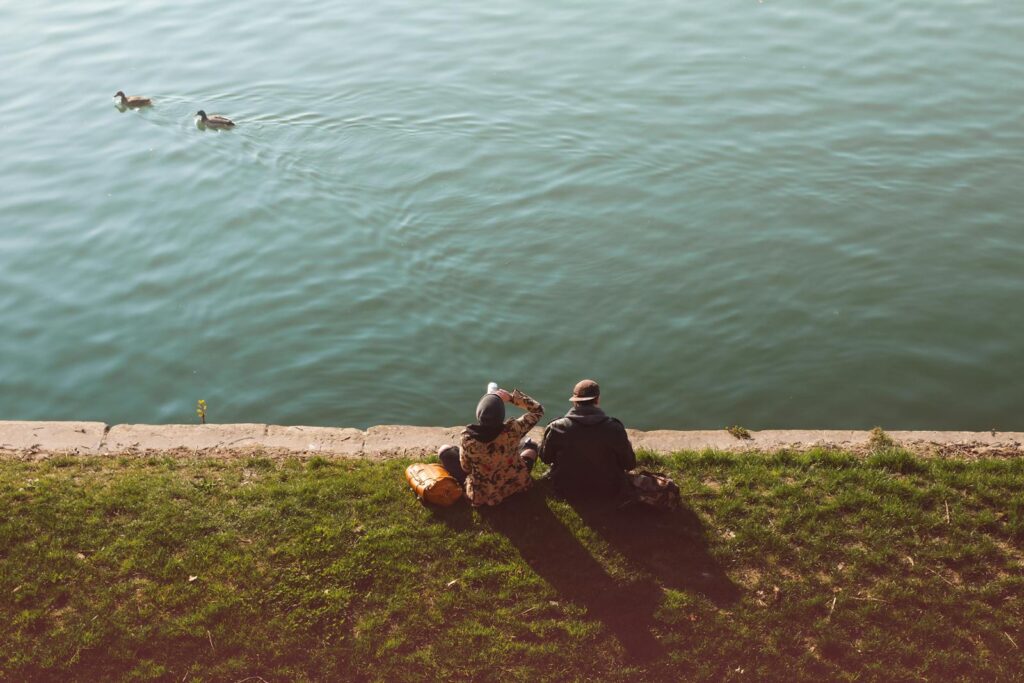 Men and Women Watching at the Beach With the Ducks - Best Cruise Ship Activities for Senior Couples