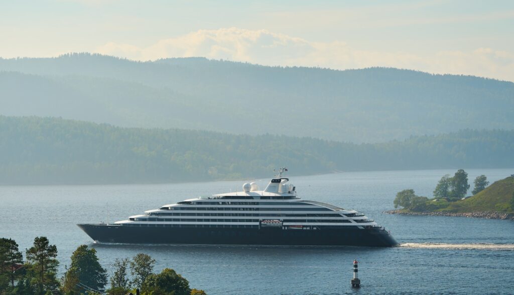 a large cruise ship in the middle of a body of water