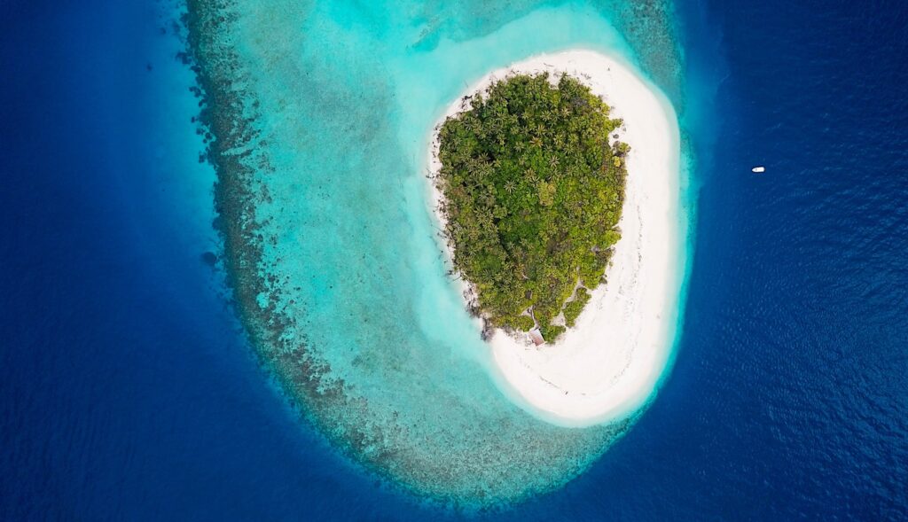 aerial view of island -  The Maldives - Island hopping for couples