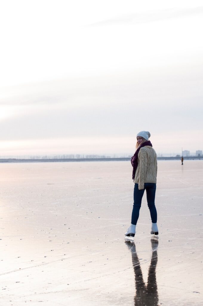 woman ice skating during daytime - things to do on a cruise